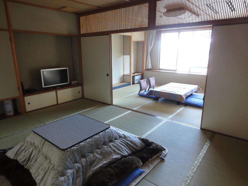 Jukeiso Hotel Hatsukaichi Værelse billede