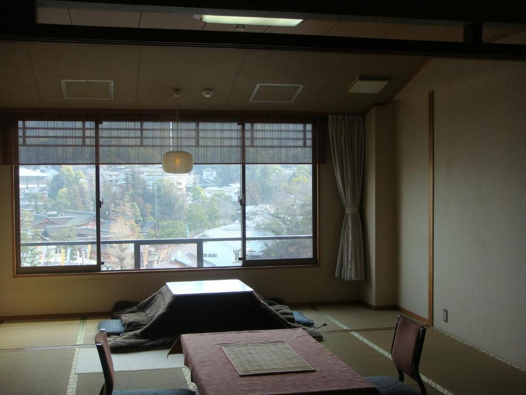 Jukeiso Hotel Hatsukaichi Værelse billede